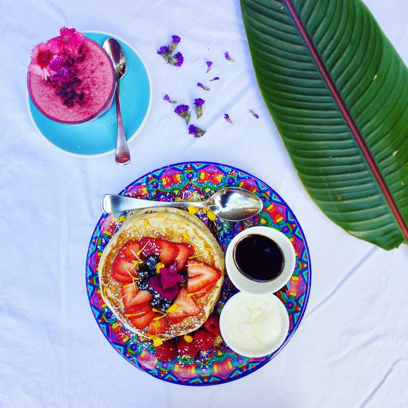 Hand painted dinnerware with sweet treats and afternoon coffee