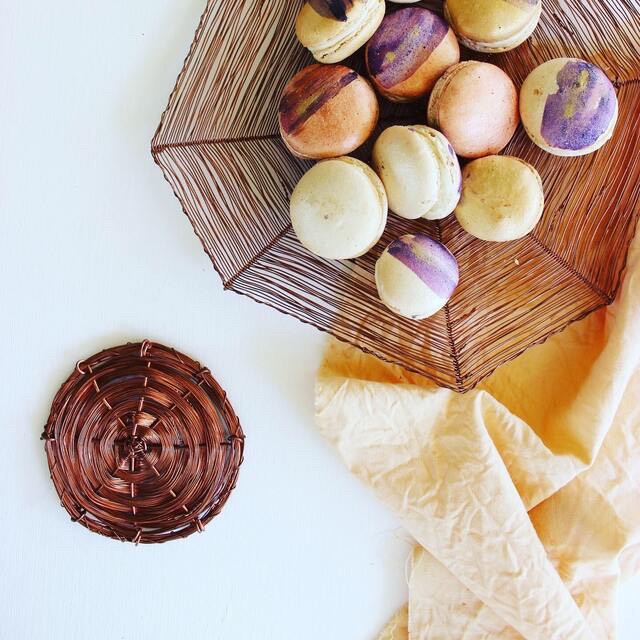 Honeycomb plate paired with honey linen tablecloth and handmade macarons