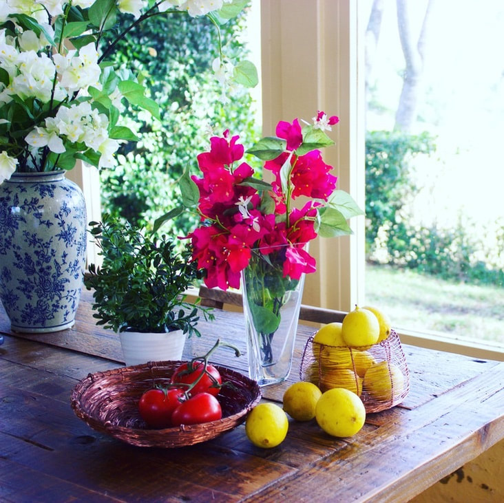 Bespoke home decor paired with fresh fruit and flowers