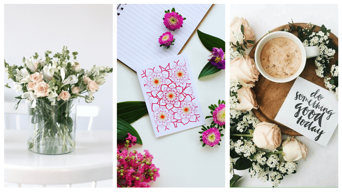 Beautiful flowers styled with artistic greeting cards and sweet treats