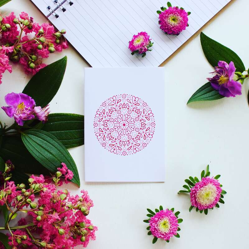 Pretty and sustainable Valentines gift cards styled with pink flowers